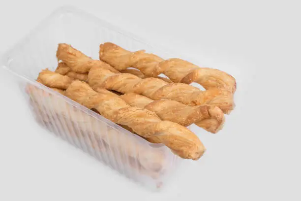 Cheese twisted Pastry stick on a white