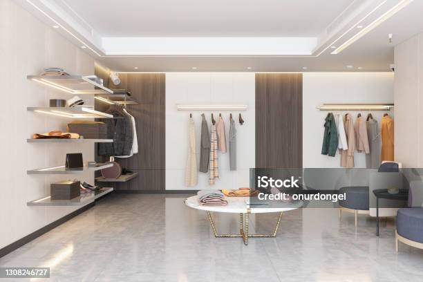 Luxury Clothing Store With Clothes Shoes And Other Personal Accessories Stock Photo - Download Image Now