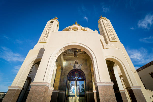 istock Public cathedral coptic egyptian church at the sky background 1308248643