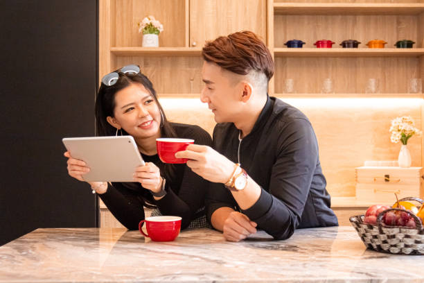 Asian Couple Enjoy Coffee