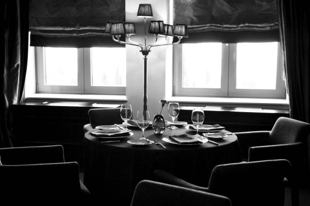 The table, the knife, the fork and the napkin in the restaurant.