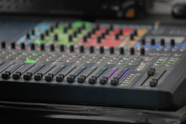 istock Closeup Analog sound mixer with selected focus. Professional audio mixing console broadcasting. 1308253868