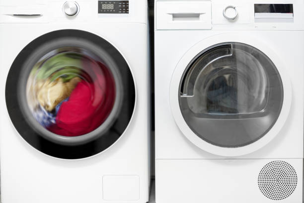 istock Front of washing and dryer machines 1308256269