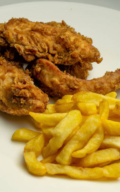 istock Fried chicken with French fries 1308257793