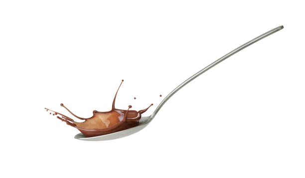 beautiful splash of chocolate on white background - sweet sauce tablespoon food sweet food imagens e fotografias de stock