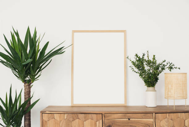 istock Blank picture frame mockup on white wall. Artwork showcase 1308262402