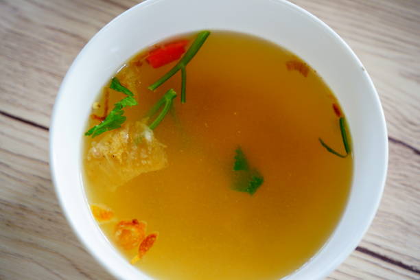 istock Broth with parsley in bowl 1308267785