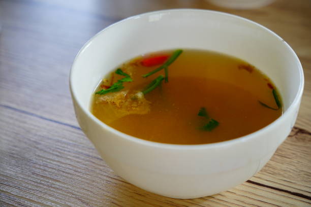 istock Broth with parsley in bowl 1308267793