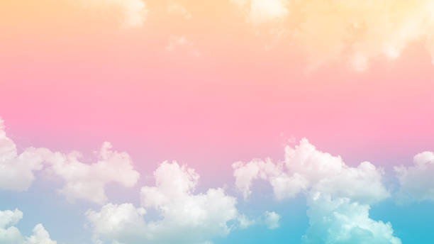 istock beauty smooth soft pastel with pink small fluffy clouds on sky. multi color rainbow image 1308267889