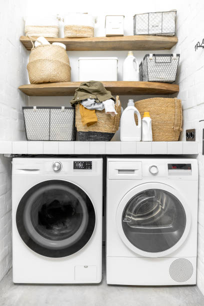istock Domestic laundry room in white tones 1308269250