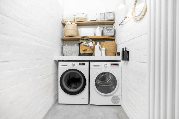 istock Domestic laundry room in white tones 1308269266
