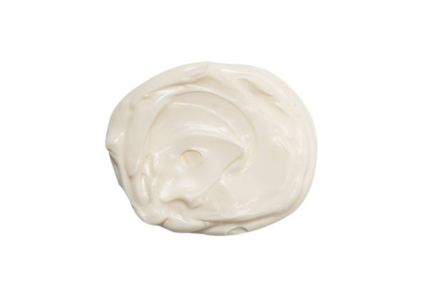 istock White sauce splashes isolated on white background. 1308270539