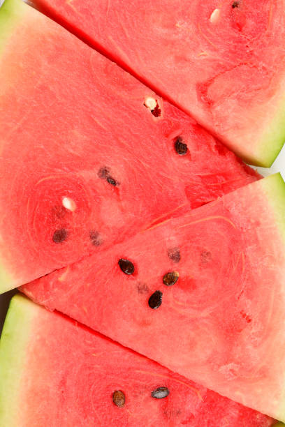 istock Juicy watermelon slices background. Top view. 1308270570