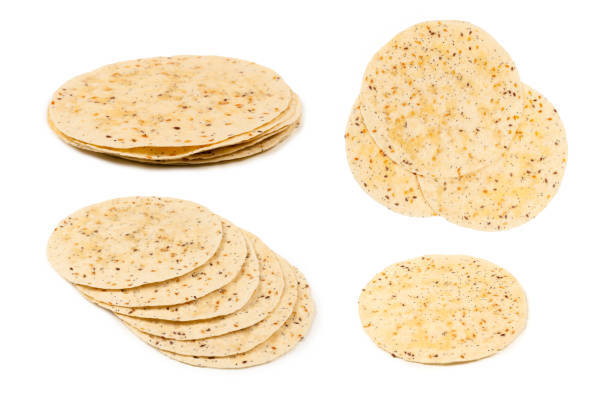 istock Pitta bread with seeds isolated on white 1308270631