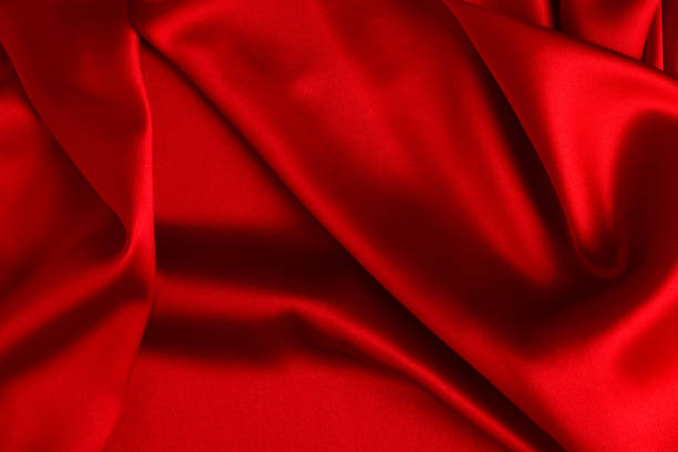 istock Red silk or satin luxury fabric texture can use as abstract background. Top view 1308270637