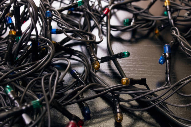 istock Garland light bulbs on a wooden table 1308271874