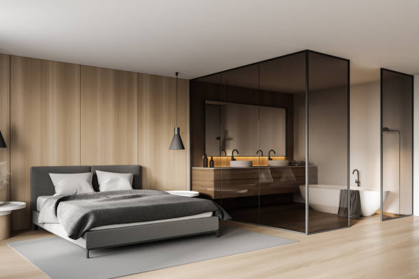 istock White and wooden master bedroom and bathroom corner 1308271904