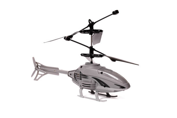 istock Gray toy helicopter isolated on white background 1308272163