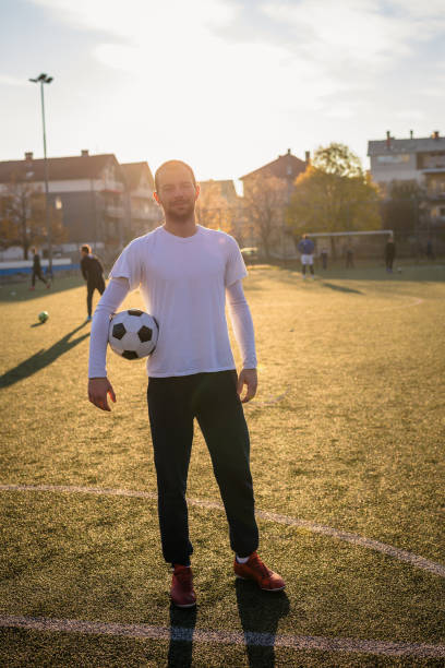 istock Portrait of a soccer player 1308273120