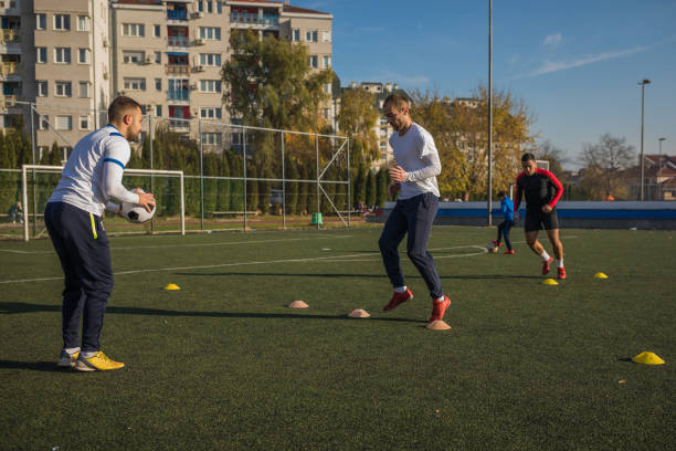 istock Guys training for the football match 1308274586