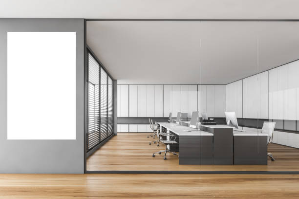 istock Mockup canvas near wooden office room with tables and computers 1308274784