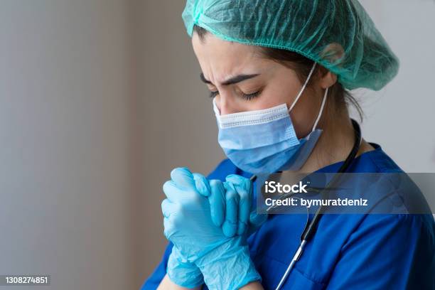 Depressed And Tired Nurse Stock Photo - Download Image Now - Nurse, Mental Burnout, Patient