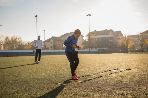 istock Young boy at the football practice 1308275503
