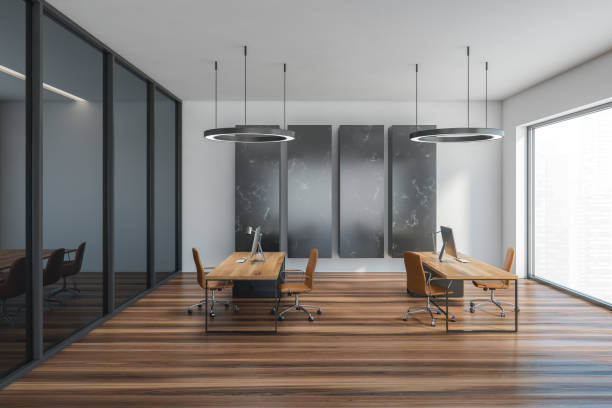istock Wooden black office room with chairs and computer on parquet floor 1308276321