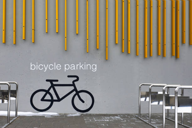 istock bicycle parking with metal stands on gray wall background 1308285038