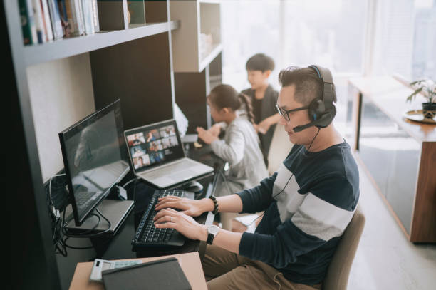 istock lifehack asian chinese father working from home with headset videocall with his colleague coworking while his children using digital tablet beside him 1308286621