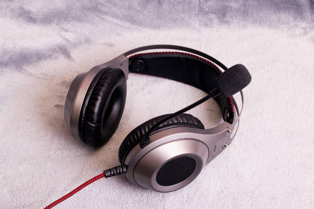 istock Big headphones on a gray background closeup 1308287599