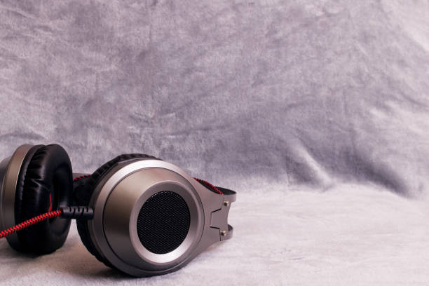 istock Big headphones on a gray background close up 1308287637