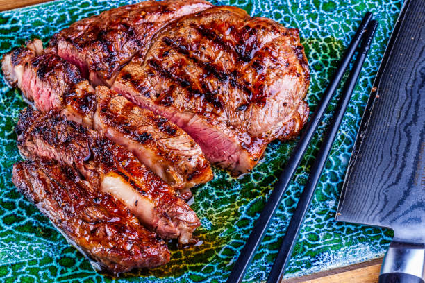 istock Sliced grilled meat steak Rib-eye. Close up 1308287683