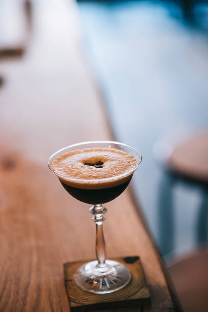 istock Cocktail martini coffee and coffee beans on top 1308288824