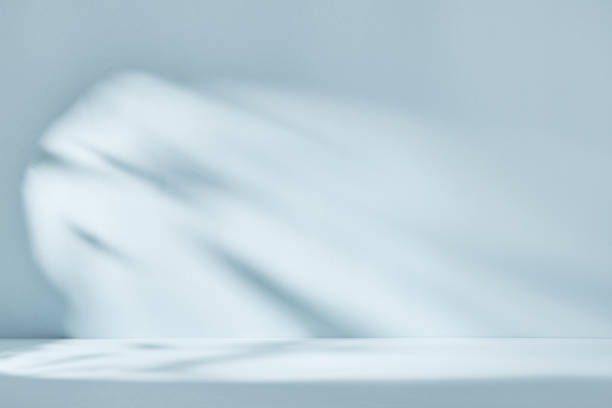 Abstract blue background with drop shadow and light. Backdrop for product presentation