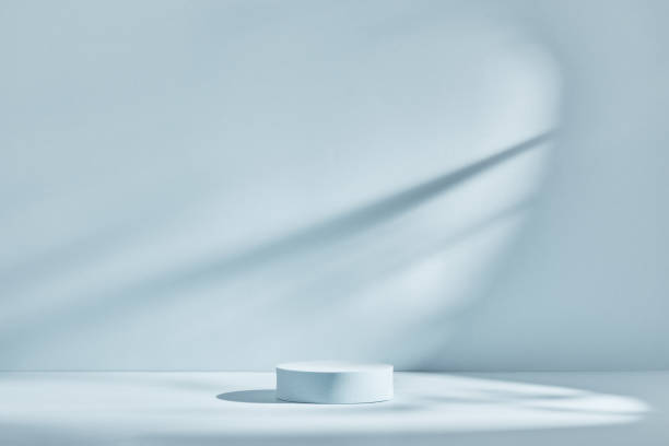 istock Blue background for product presentation with shadows and light. Empty round podium. Mockup. 1308289295