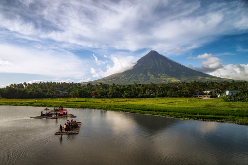 Aerial view of Mount Mayon Volcano and Sumlang Lake near Legazpi City in Albay, Philippines.