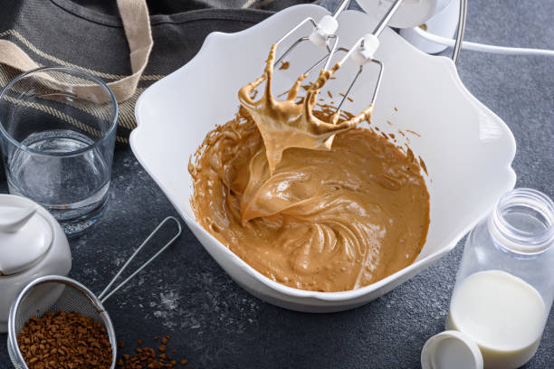 istock Cooking step-by-step Korean Dalgona coffee. Whipping coffee, water and sugar. Step 2. 1308292639