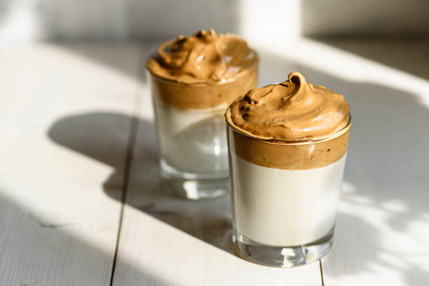 istock trendy korean coffee in two glasses on white background with shadow 1308293813