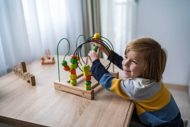 istock Sweet boy with wooden toy 1308293929