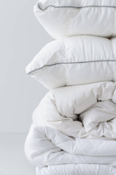 istock Fluffy White Cotton Pillows and a Duvet 1308295175