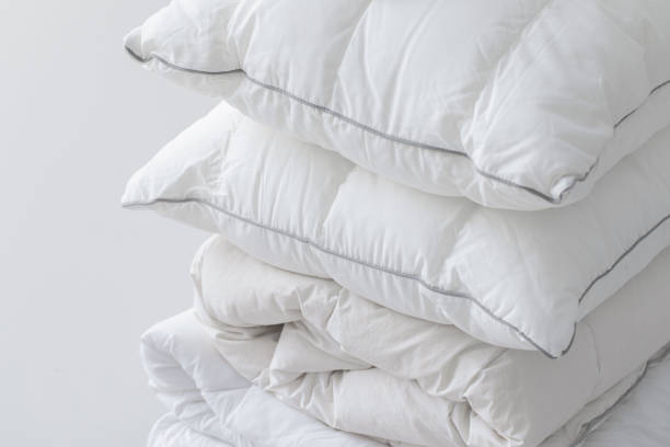 istock Fluffy White Cotton Pillows and a Duvet 1308295180