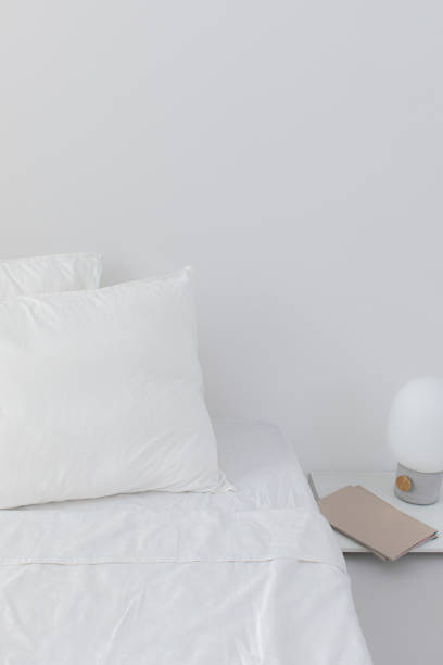 istock Neat and Clean Bed in a Hotel Room 1308295201