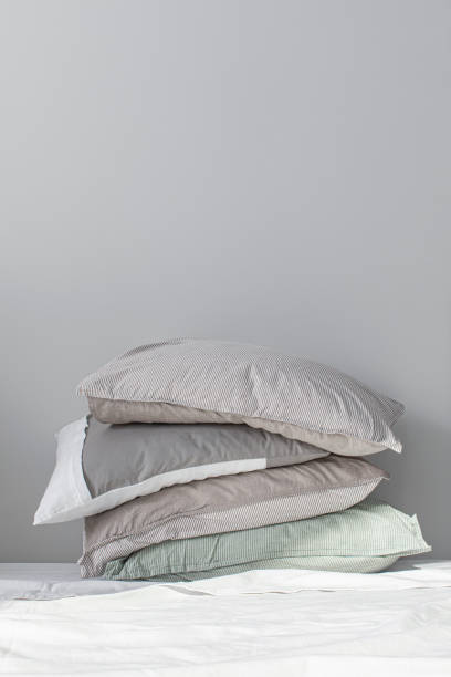 istock Stack of Pillows in Pillow Cases Made of Natural Materials (Copy Space) 1308295226
