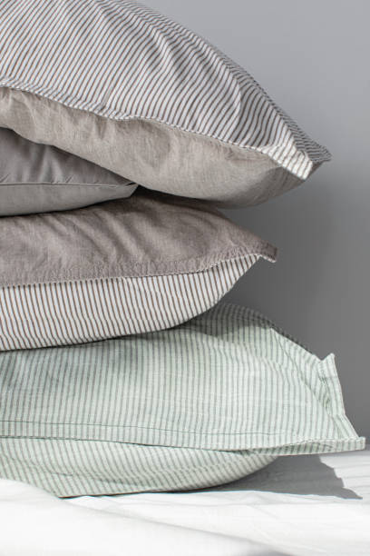 istock Stack of Pillows in Pillow Cases Made of Natural Materials 1308295236