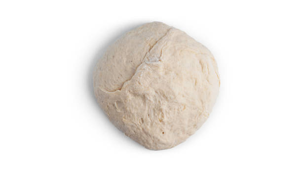istock Raw dough isolated on white background 1308296390
