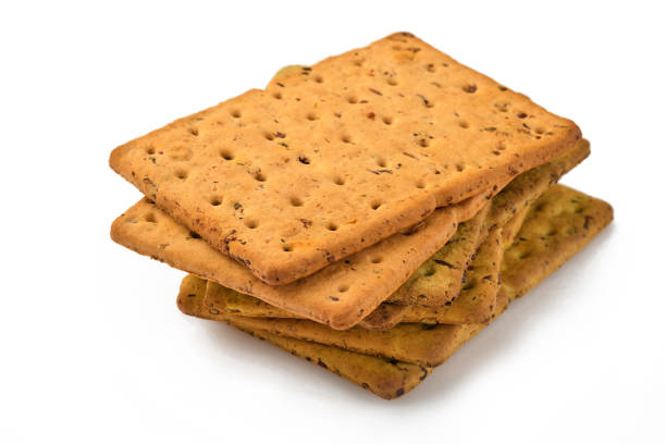 istock Cracker with flax seeds and oat bran rectangular shape for healthy, dietary and balanced diet isolated on white background. Snack for proper nutrition 1308297270