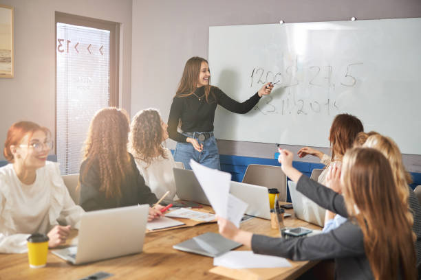 istock Business colleagues discussing project in modern office 1308299114