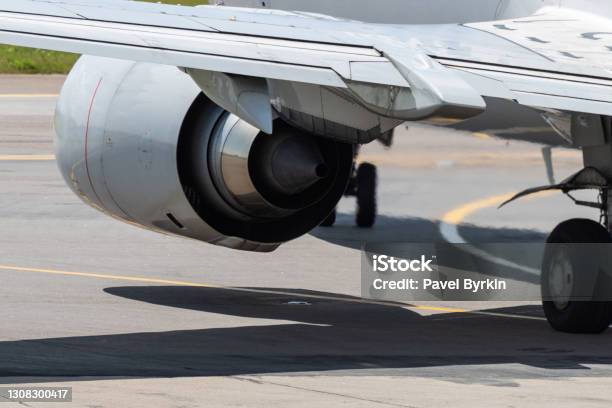 Airplane At The International Airport Stock Photo - Download Image Now - Airplane, Electric Motor, Healthcare And Medicine