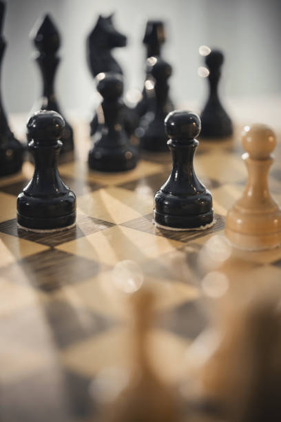 istock Wooden chess pieces on the chessboard. 1308301451